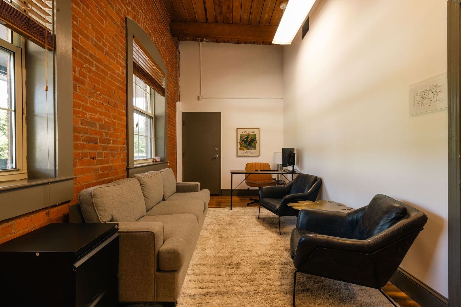 Group therapy room with natural light at the New Milford center