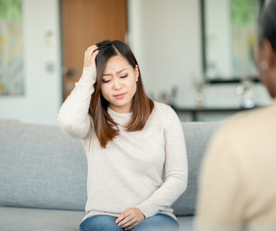 A person in a long-term alcohol rehab program receiving individual counseling