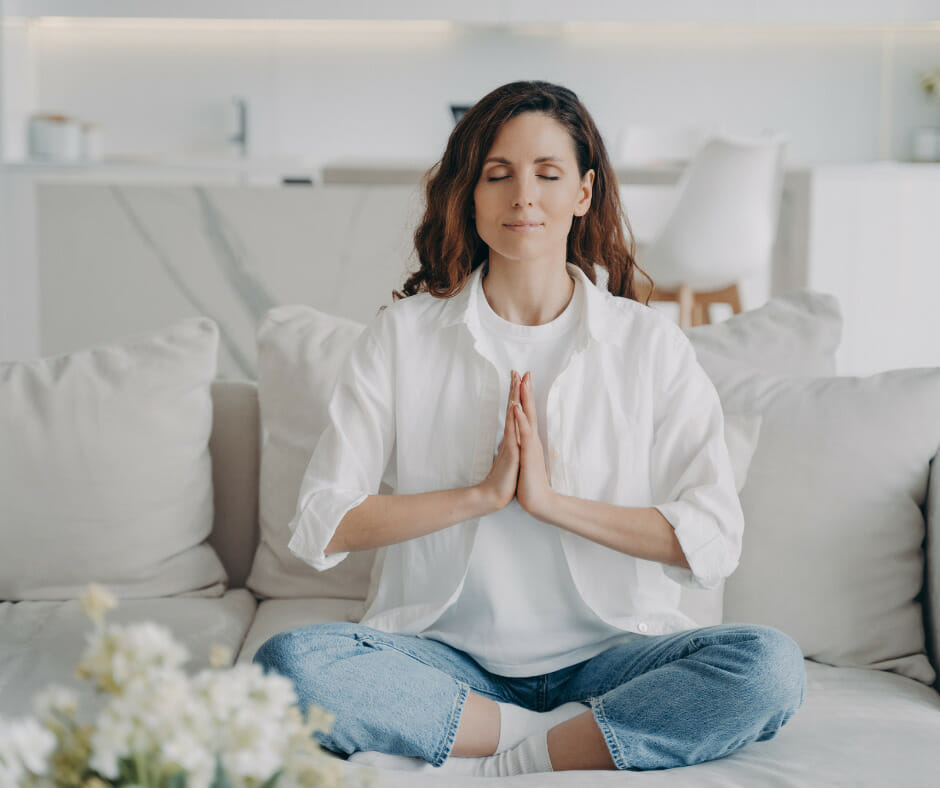 A person practicing mindfulness techniques to reduce stress